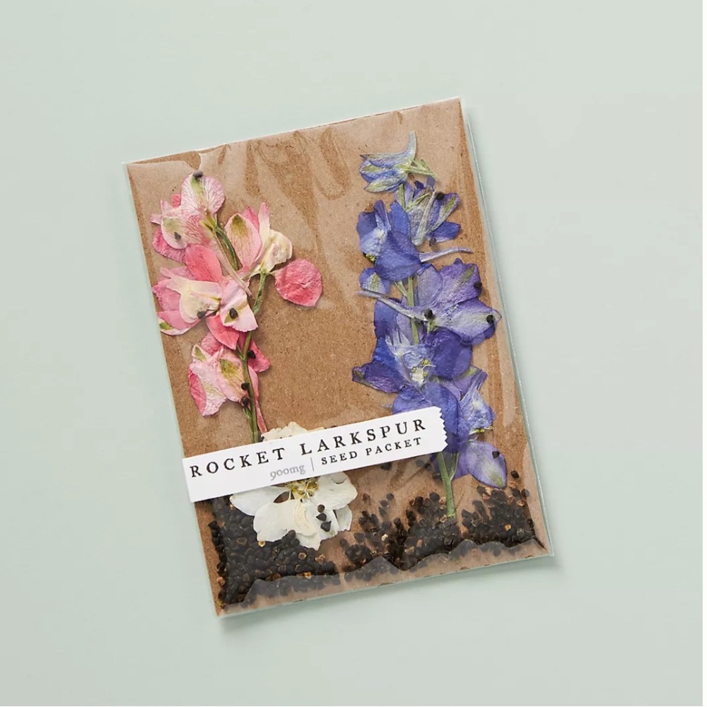 ANTHROPOLOGIE ROSY RINGS BLOSSOM SEED PACKET ROCKET LARKSPUR NEW
